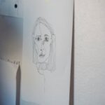 a drawing taped on a wall